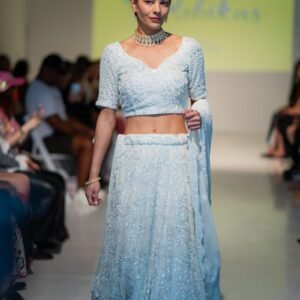 Bridal Lehenga in Pearl White featuring intricate pearl work.