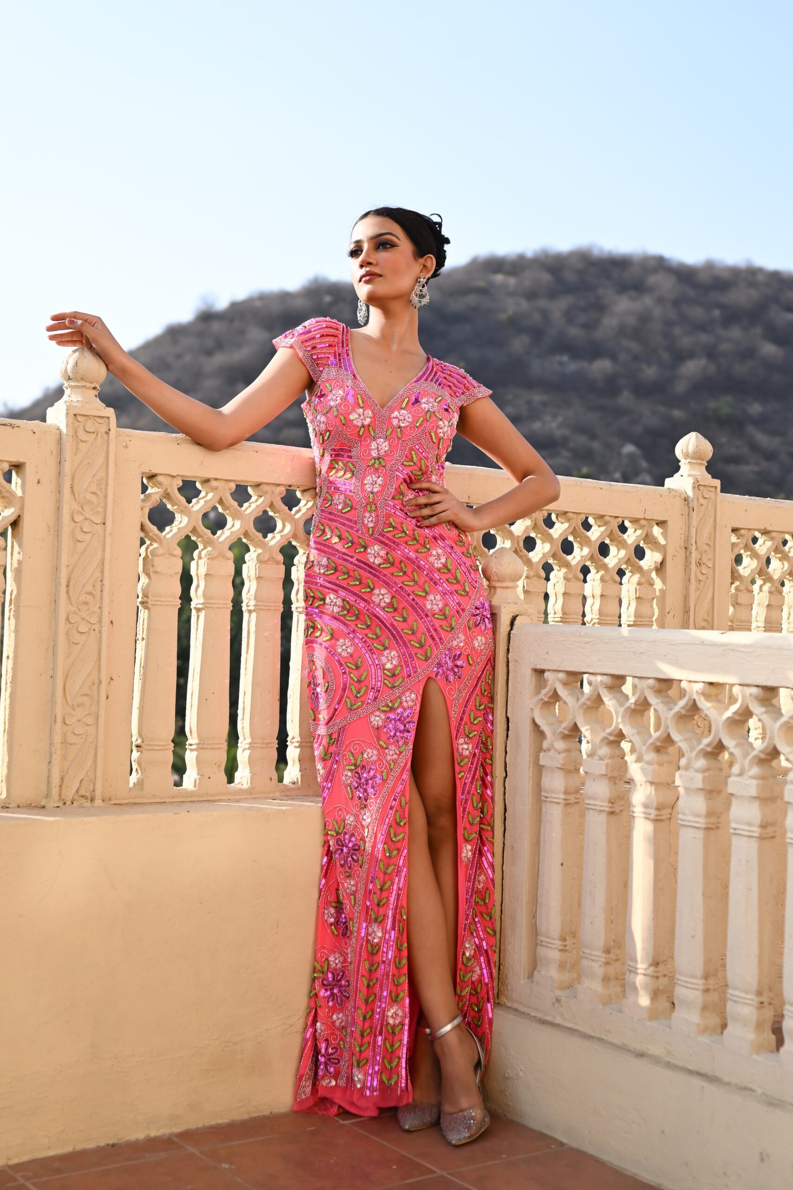 Neon Pink Evening Gown with a thigh-high slit