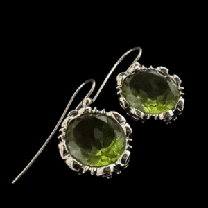 Add a touch of elegance to your outfit with these stunning Genuine Silver Earrings featuring light green stones. Perfect for adding a pop of color to any ensemble. Silver 92.5%