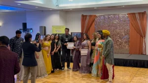 Award from Sonu Sood during Vibha event.